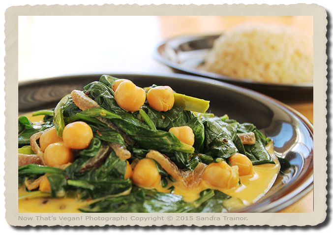 A recipe for a spinach and chickpeas in an Indian spiced sauce.