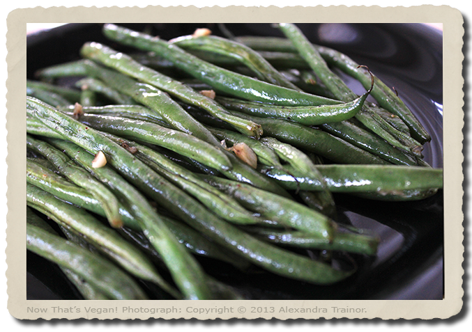 French greanbeans with garlic and shallots, coated in seasoned oil before roasting.