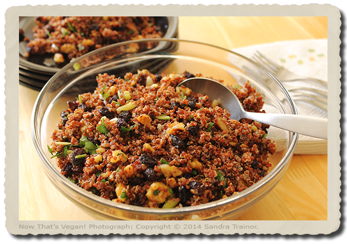 A salad made with red quinoa and raisins.